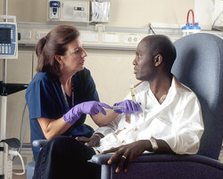 Nurse administering chemotherapy